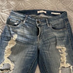 Guess Jeans.  Power curvy mid size 27.  Distressed
